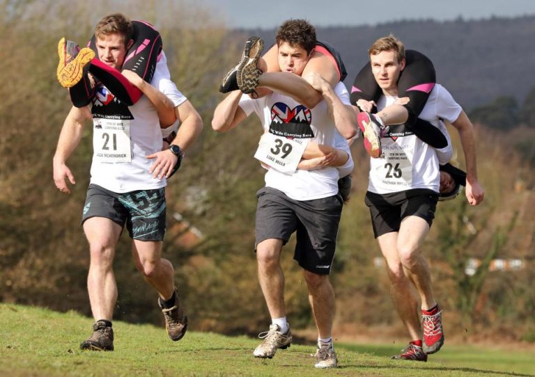 This Race Sees Men Competing To Carry Their Chubby Wives Over The Finish Line