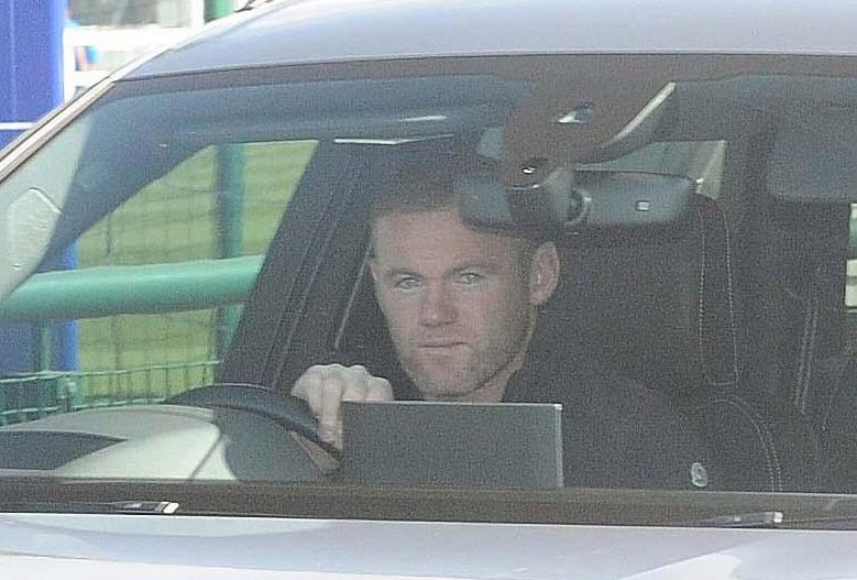 Wayne Rooney driving