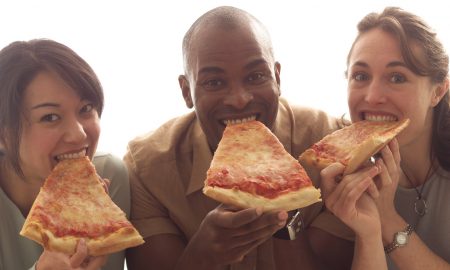 Three Friends Eating Pizza