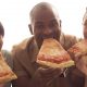 Three Friends Eating Pizza