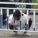 Woman Head Stuck Barrier