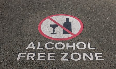 alcohol free zone sign on pavement