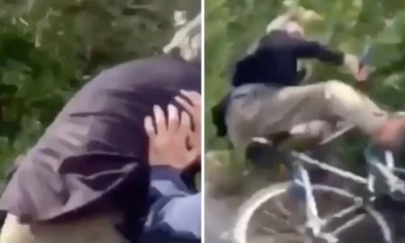 Eldelry Man Pushed Bike