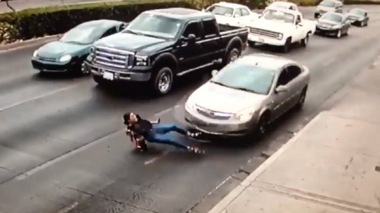 Woman In High Heels Slips And Is Hit By Car