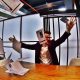 Business man throwing paperwork in frustration