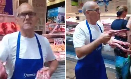 Butcher Swinging Meat