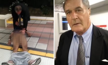 White MAn Drags Black Man Off Train