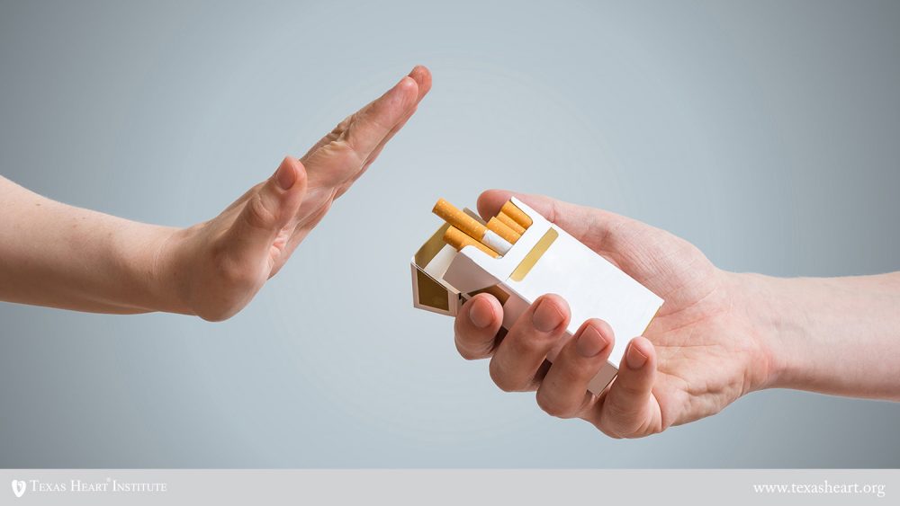 Quitting smoking concept. Hand is refusing cigarette offer.