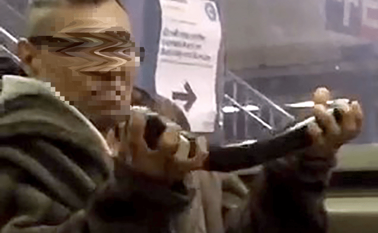 Here’s A Guy Playing With A Massive Dildo On The Subway