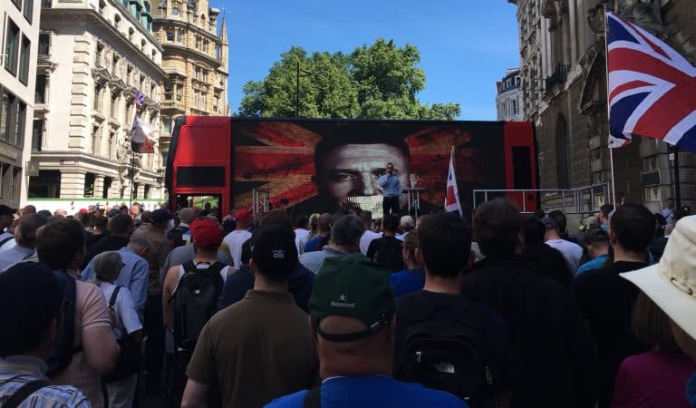 Tommy Robinson Supporters Blockade Road Outside Old Bailey With Giant Screen Of His Face