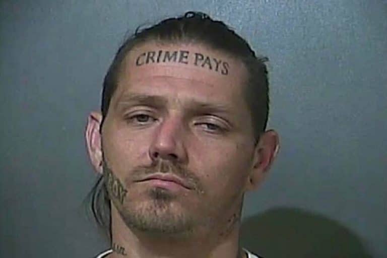 Police Are Hunting A Man With ‘Crime Pays’ Tattooed On His Forehead