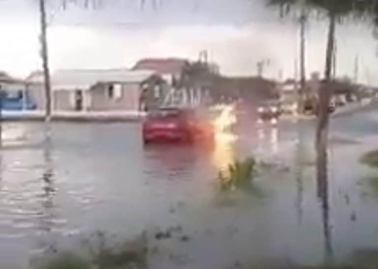Watch This Car Drive Into A Flood And Then Catch Fire And Explode