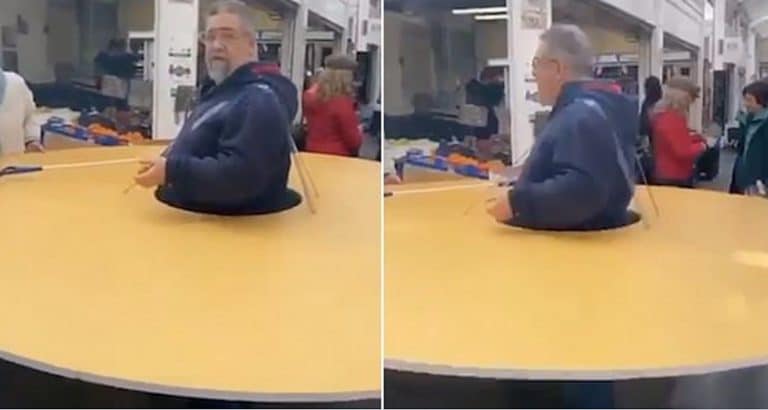 An Italian Man Is Wearing A ‘Social Isolation Disc’ To Protect Himself From Coronavirus