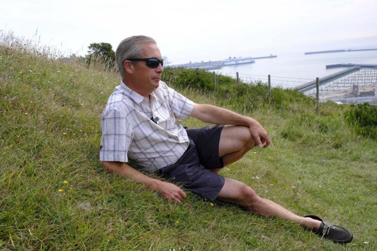 Nigel Farage Is Being Body Shamed Over This Photo Of Him Watching For Refugees At Dover