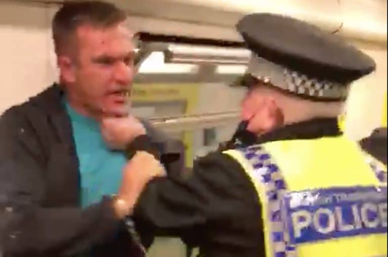 Watch A Policeman Attack And Arrest A Man For Not Wearing A Mask On A Train