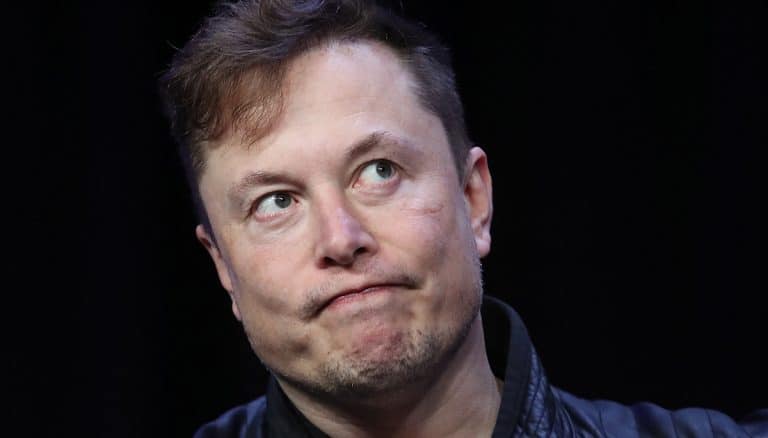 Someone Got An Absolutely Ridiculous Tattoo Of A Stoned Elon Musk On Their Leg